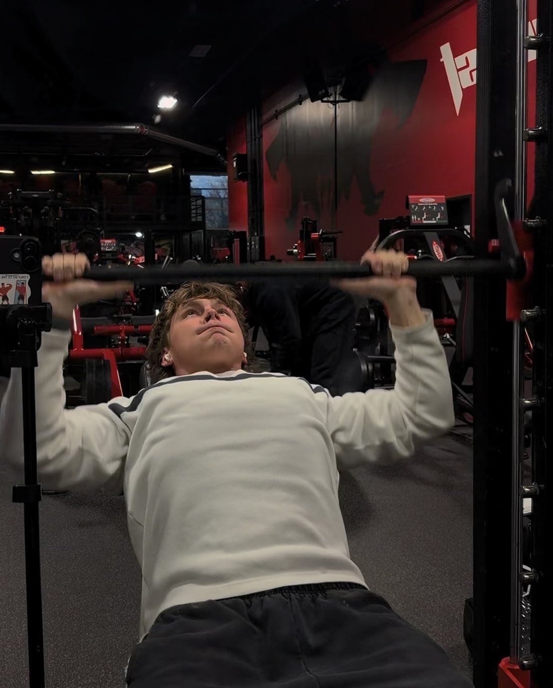 Stepan doing an incline press on a Smith machine